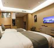 Kamar Tidur 6 ZUO AN International Hotel