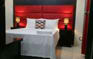 Bedroom 5 Luxury Suites E