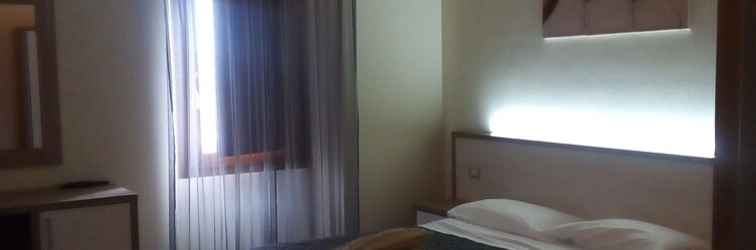 Bedroom Hotel Ristorante Cantina Langelina