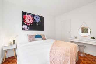Bedroom 4 Balcony Retreat Apartment by Ready Set Host