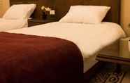 Kamar Tidur 7 La PLace Hotel