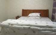 Kamar Tidur 3 Wenxin Hotel Tianjin