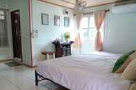 ห้องนอน Green Riverside Homestay