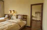 Kamar Tidur 3 Snow Lion Riverside Resort