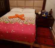 Kamar Tidur 3 African Home Accommodation