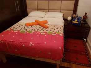 Kamar Tidur 4 African Home Accommodation