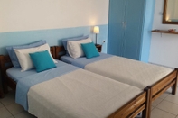 Kamar Tidur Diosmarini Studios & Apartments