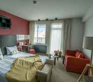 Kamar Tidur 4 Riverside Boutique Hotel