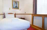 Bilik Tidur 5 Europa House Hotel