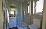 In-room Bathroom 6 Heathrow Living Serviced Apartments by Ferndale