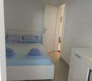 Kamar Tidur 2 Beach House Paradiso