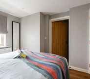 Bedroom 6 The Norfolk Maisonette - Lovely 4BDR Mews Home in Paddington