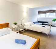 Bedroom 5 The Southwick Sanctuary - Large & Modern 6BDR Home with Private Terrace