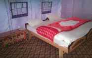 Kamar Tidur 6 Auspicious Camps and Cottages