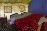 Bilik Tidur Auspicious Camps and Cottages