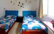 Kamar Tidur 3 Yangshuo Showbiz Youth Hostel