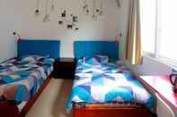 Kamar Tidur Yangshuo Showbiz Youth Hostel