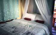 Kamar Tidur 5 Songphu Homestay