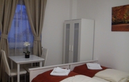 Phòng ngủ 4 Arena Suites Hannover