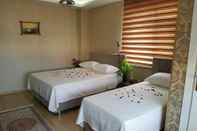 ห้องนอน Sulun Butik Otel