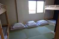 ห้องนอน Minshuku Koide