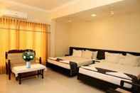 ห้องนอน Hotel Sri Devi