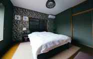 Bedroom 6 Hiroshima Danbara Guesthouse by EXseed