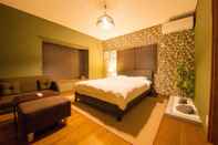 Bedroom Hiroshima Danbara Guesthouse by EXseed