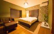 Phòng ngủ 2 Hiroshima Danbara Guesthouse by EXseed
