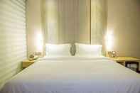 ห้องนอน Lavande Hotels
