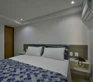 Kamar Tidur 6 Littoral Gold Flat