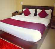 Phòng ngủ 6 Hotel Vasundhra
