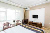 ห้องนอน Dalian Bo Ke Business Apartment