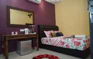 Kamar Tidur 7 Ghazrin's Classic Hotel