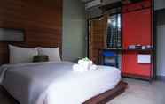 Kamar Tidur 4 Huen Chang Puek Hotel