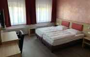 Bedroom 2 Hotel Well Garni