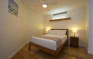 Kamar Tidur 7 Maggies Beachfront Apt. 8