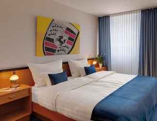Bedroom 2 Motorsport Hotel