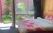 Bilik Tidur 2 Dolphins Beach House - Hostel