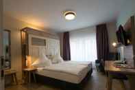 Phòng ngủ Weinbar und Hotel FahrAway