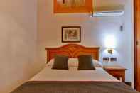 Bilik Tidur Hotel Las Palmeras by Vivere Stays