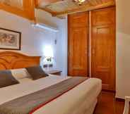 Bedroom 3 Hotel Las Palmeras by Vivere Stays