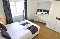 Kamar Tidur Kensington Hotel Apartments