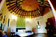 ห้องนอน Khemmarat Baandin Resort