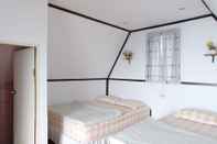 Kamar Tidur Ukrist Farm Hill Resort