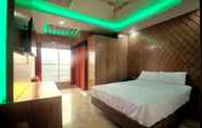 Phòng ngủ 2 Galaxy Resort Limited
