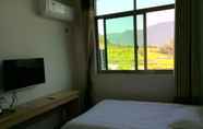 Kamar Tidur 3 Wuyuan Jiangling View Inn