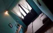 Kamar Tidur 6 The Local Story Home Stay 2