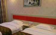 Bilik Tidur 4 Xin Jia Yuan Business Hotel