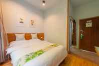 Kamar Tidur Yangshuo 9 Time Hotel